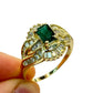 14Kt LADIES EMERALD SOLITAIRE AND DIAMOND ENCRUSTED RING. 1CTW EMERALD | .80CTW DIAMOND