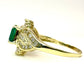 14Kt LADIES EMERALD SOLITAIRE AND DIAMOND ENCRUSTED RING. 1CTW EMERALD | .80CTW DIAMOND